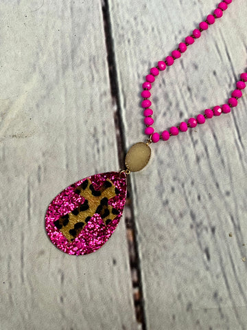 NEON PINK LEOPARD CROSS NECKLACE